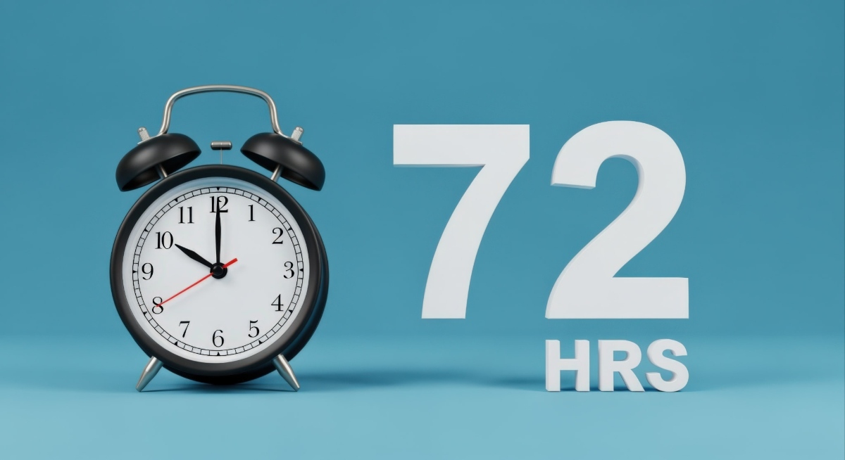 痛みを我慢する限界を示す時計と72時間の文字